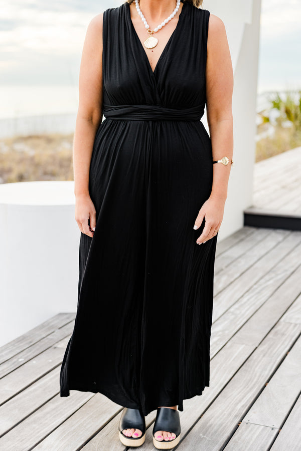 Chic Soul plus size clothing, black sleeveless jumpsuit with wide leg and tie waist detail with v neckline and tie detail on the back with pockets