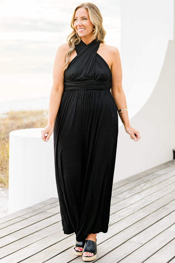 Chic Soul plus size clothing, black sleeveless jumpsuit with wide leg and tie waist detail with v neckline and tie detail on the back with pockets