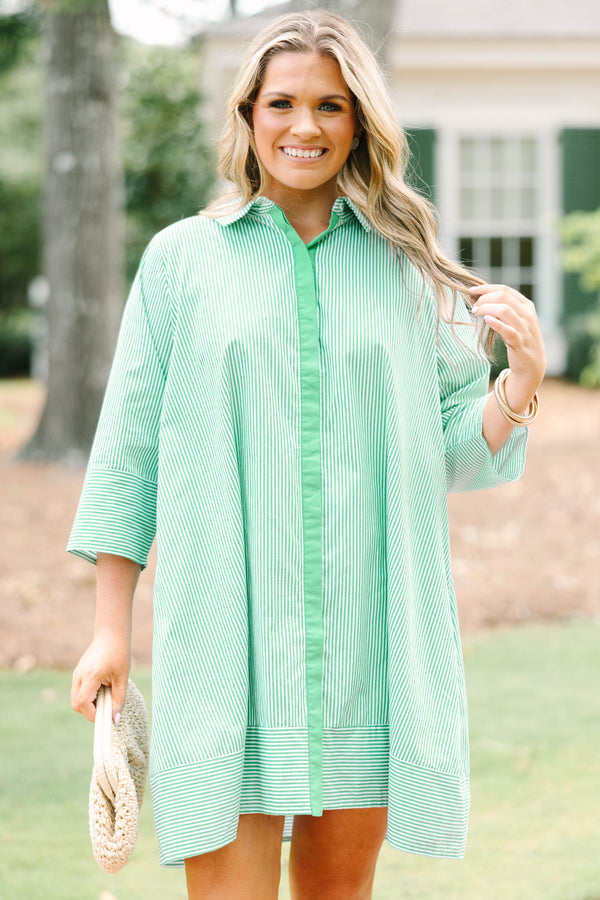 Plus size green and white striped cotton shirt dress with three-quarter sleeves and a flowy fit.