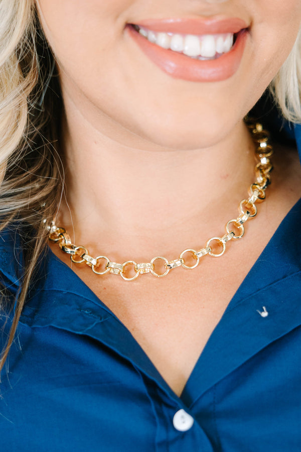 Gold-tone chunky rolo chain necklace features polished round interlocking links with a bright metallic finish