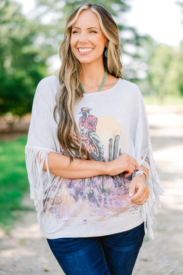 Chic Soul plus size clothing, heather gray top with a wild west graphic on the center of the shirt and fringe details at the end of each sleeve 