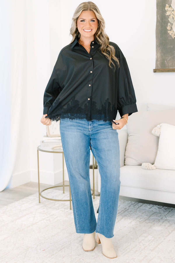 Plus size black button-down top with a flowy fit and delicate lace hem detail.