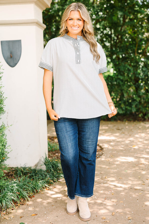Plus size gray striped top with a flowy fit, gingham trim collar, and button-down neckline.