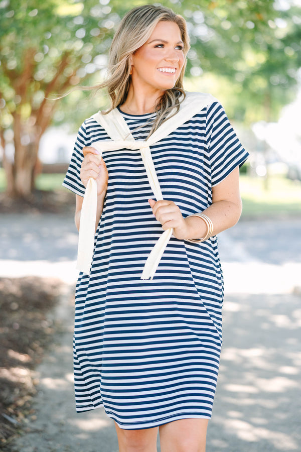 Plus Size navy and white horizontal striped t-shirt dress with a cream faux shawl detail.