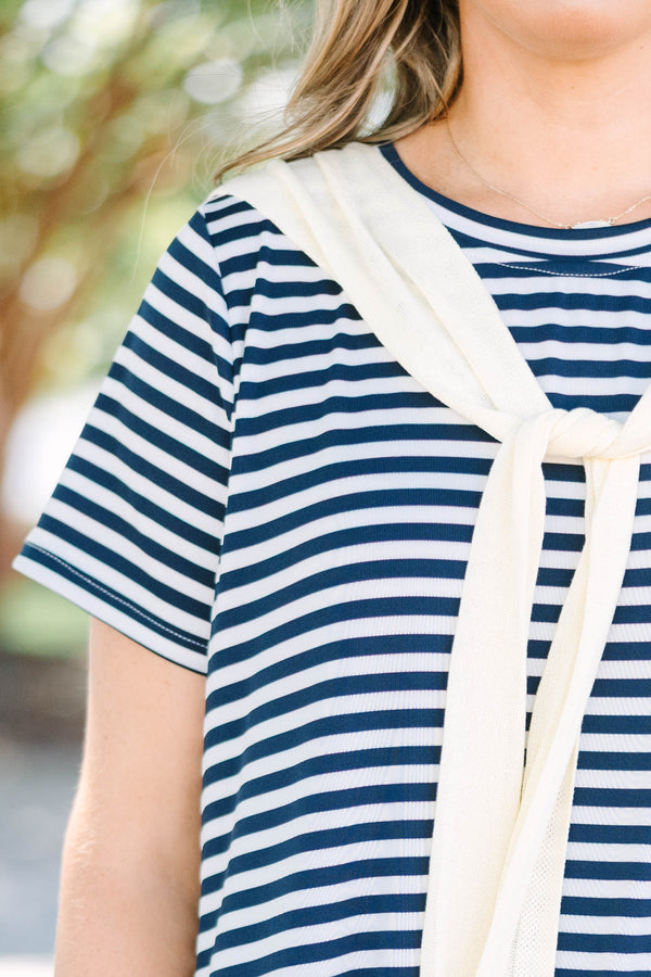 Plus Size navy and white horizontal striped t-shirt dress with a cream faux shawl detail.