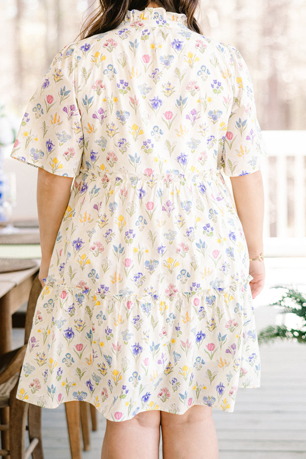 Chic Soul plus size clothing, short-sleeve white ruffled baby doll dress with a split-v-neckline and a multi-colored floral pattern