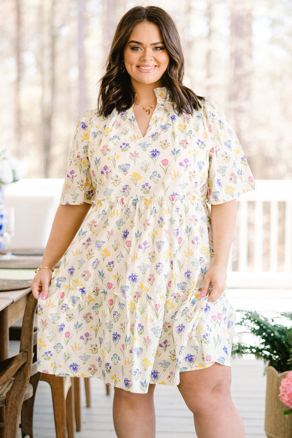 Chic Soul plus size clothing, short-sleeve white ruffled baby doll dress with a split-v-neckline and a multi-colored floral pattern