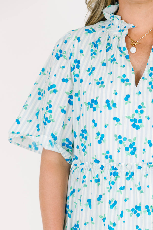 Plus Size blue and white striped tiered dress with a blue floral print and short flutter sleeves.