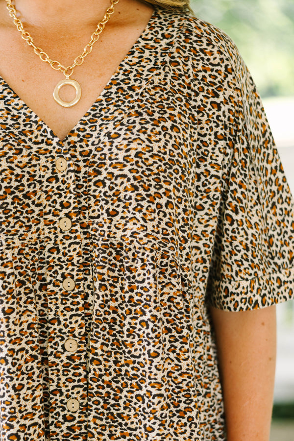 Plus Size brown leopard print romper with short sleeves, a V-neckline, and front button details.