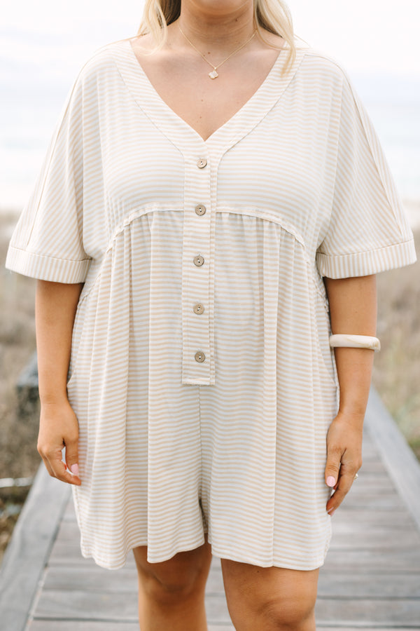 Chic Soul plus size clothing,  brown striped romper with short sleeves that have cuffs at the end of them as well as a v-neckline and buttons going down the center of the chest to the bottom of the belly 
