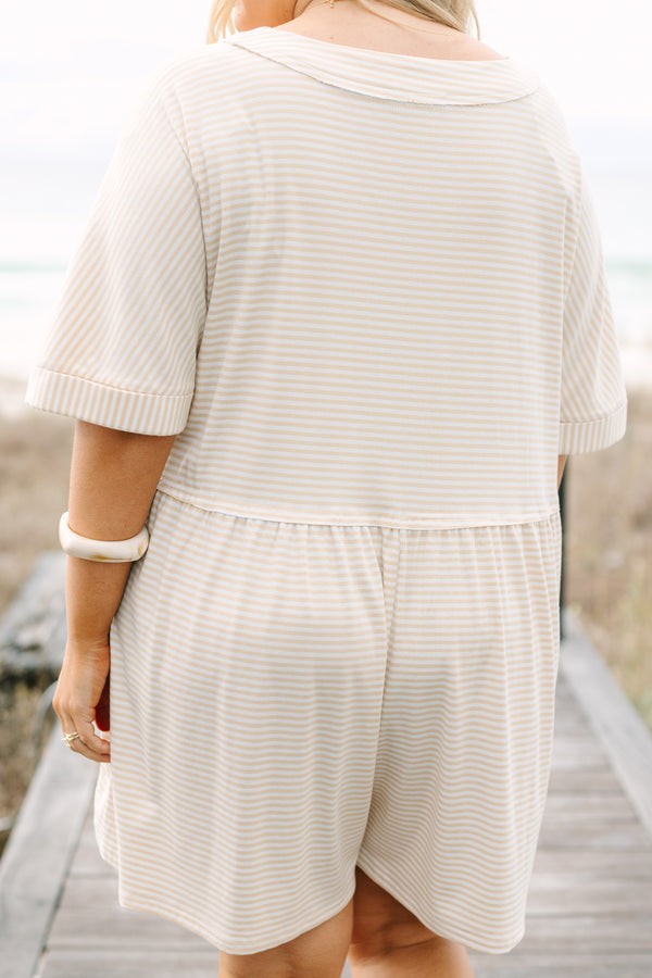 Chic Soul plus size clothing,  brown striped romper with short sleeves that have cuffs at the end of them as well as a v-neckline and buttons going down the center of the chest to the bottom of the belly 
