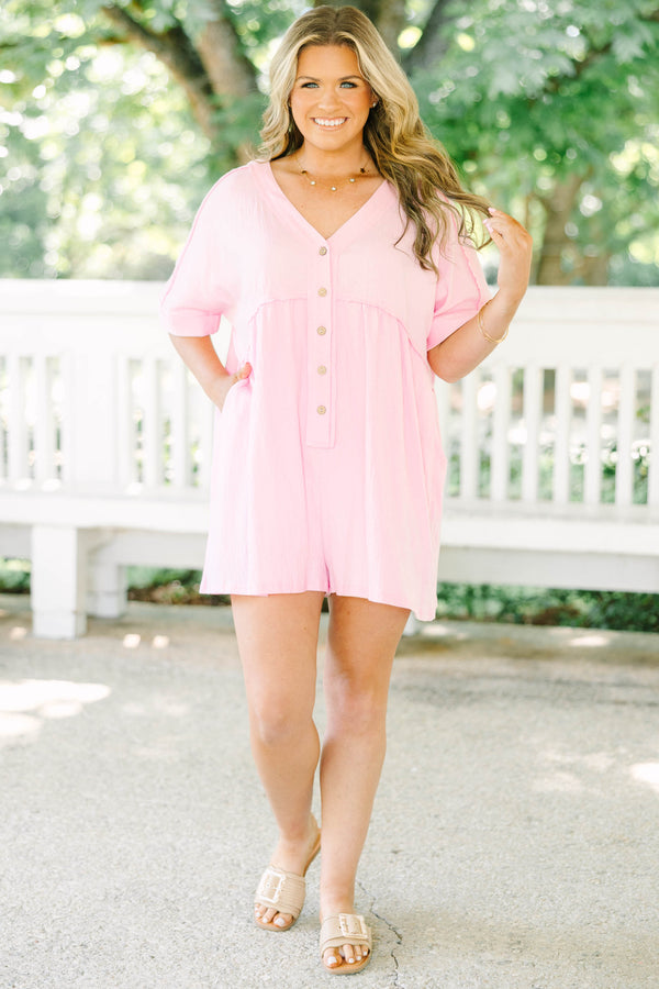 Plus Size orchid pink short sleeve romper with a V-neckline and button-down front detail.