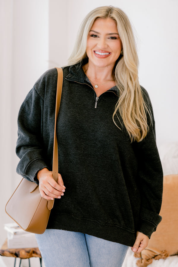 Chic Soul plus size clothing, black long sleeve pullover with a zipper that goes down to the top of the chest as well as a collar 