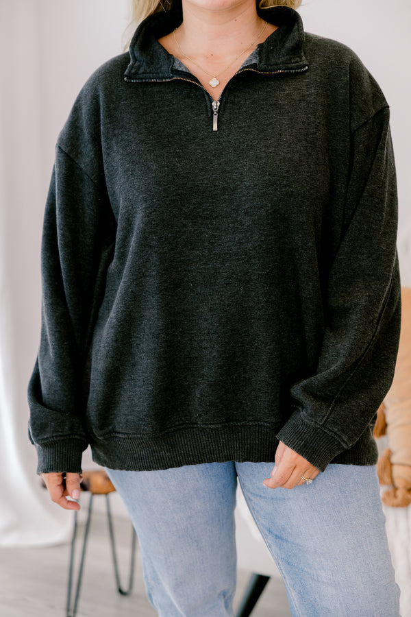 Chic Soul plus size clothing, black long sleeve pullover with a zipper that goes down to the top of the chest as well as a collar 