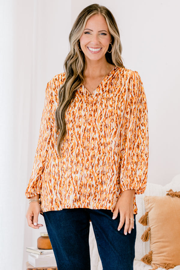 Chic Soul plus size clothing, mustard and red abstract pattern long sleeve top with cinched sleeves at the wrist