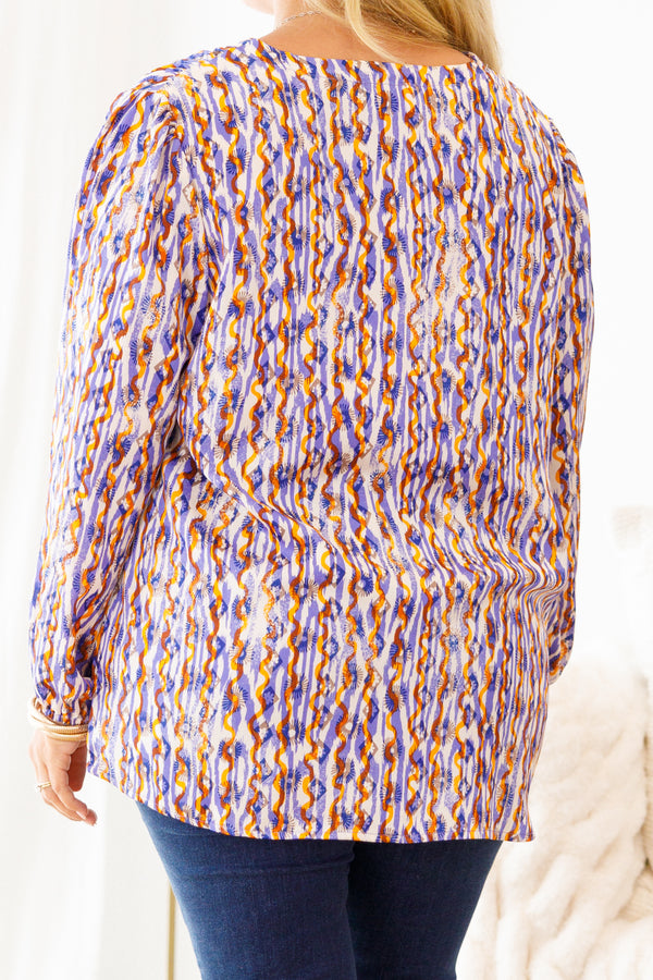 Chic Soul Plus size clothing, multi-color long sleeve top with an abstract pattern and slight v-neckline
