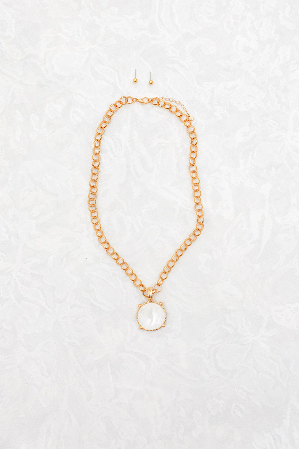 Chic Soul plus size clothing, white circle pendant attached to a gold link necklace and a pair of small gold studs that come with it 