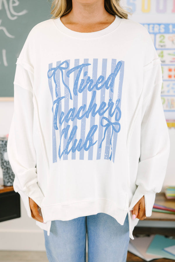 Plus size ivory oversized sweatshirt with blue graphics that say 