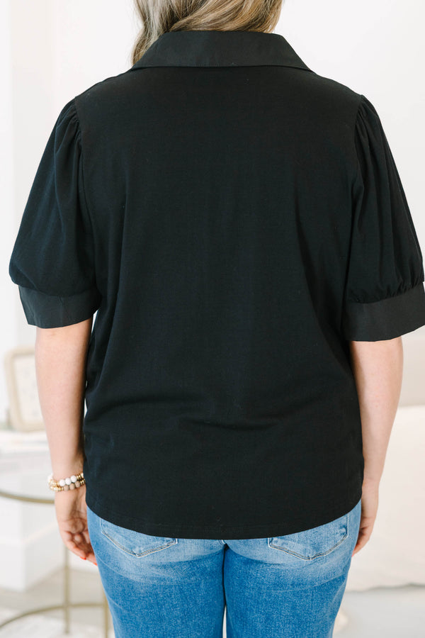 Plus Size black collared top with a v-neckline and puffed half-sleeves with cuffed finishes.