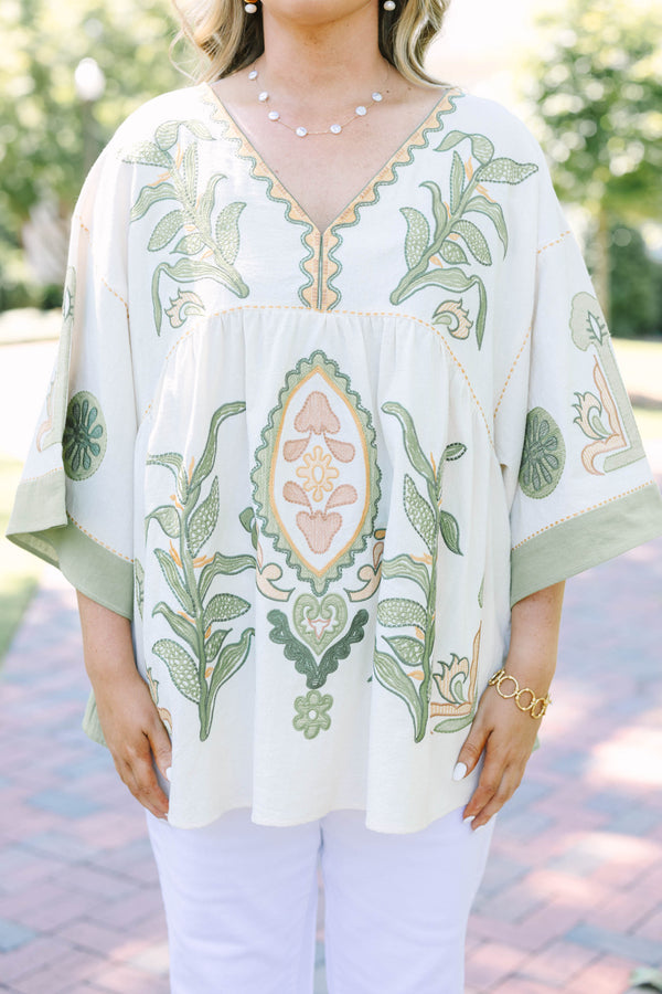 Plus size top in olive, a flowy 100% cotton boho blouse with intricate embroidery.