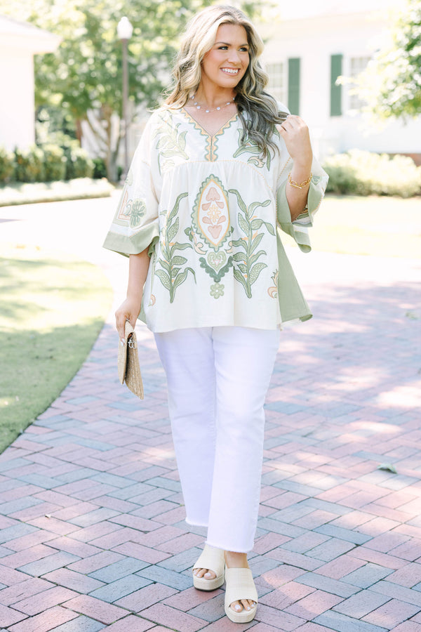 Plus size top in olive, a flowy 100% cotton boho blouse with intricate embroidery.
