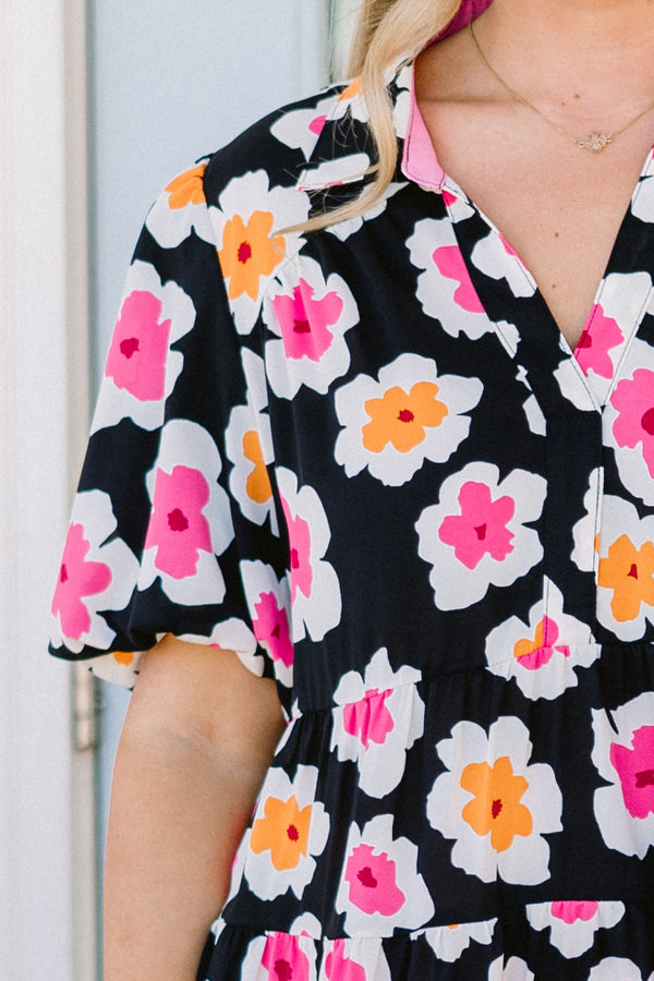 Chic Soul plus size clothing, black short sleeve tiered mini dress with v neckline and puff sleeves with large orange and pink floral pattern