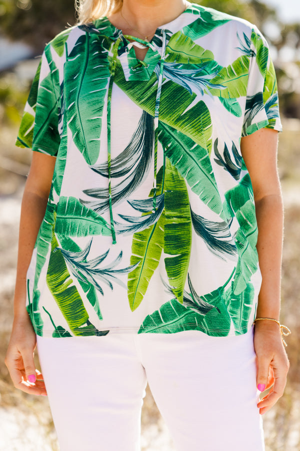 Chic Soul plus size clothing, Short sleeve white casual top with a leaf pattern and s light v-neck with a draw-string detail
