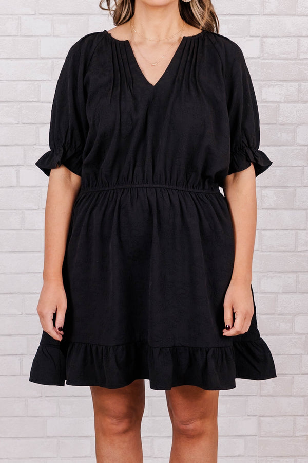Chic Soul plus size clothing, black short sleeve mini dress with v neck and synched waist with ruffle along sleeves and bottom