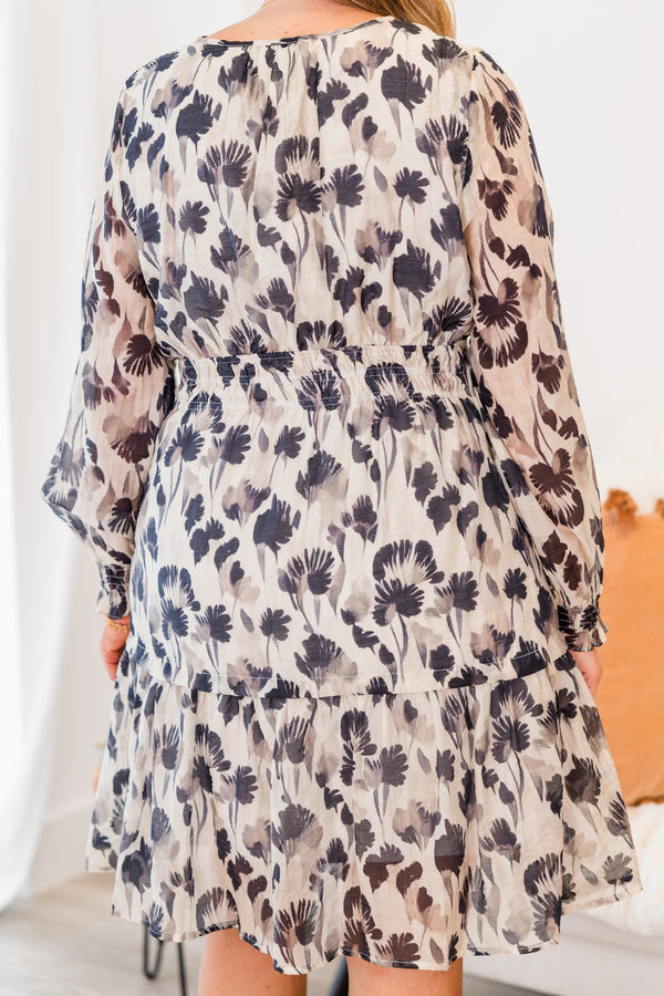 Chic Soul plus size clothing, black long sleeve mini dress with tiered detail with synch waist with cuff sleeves and v neckline with floral print