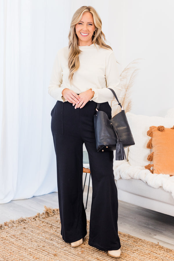 Chic Soul plus size clothing, black long straight leg pants with large pockets on the side with stretchy waistband
