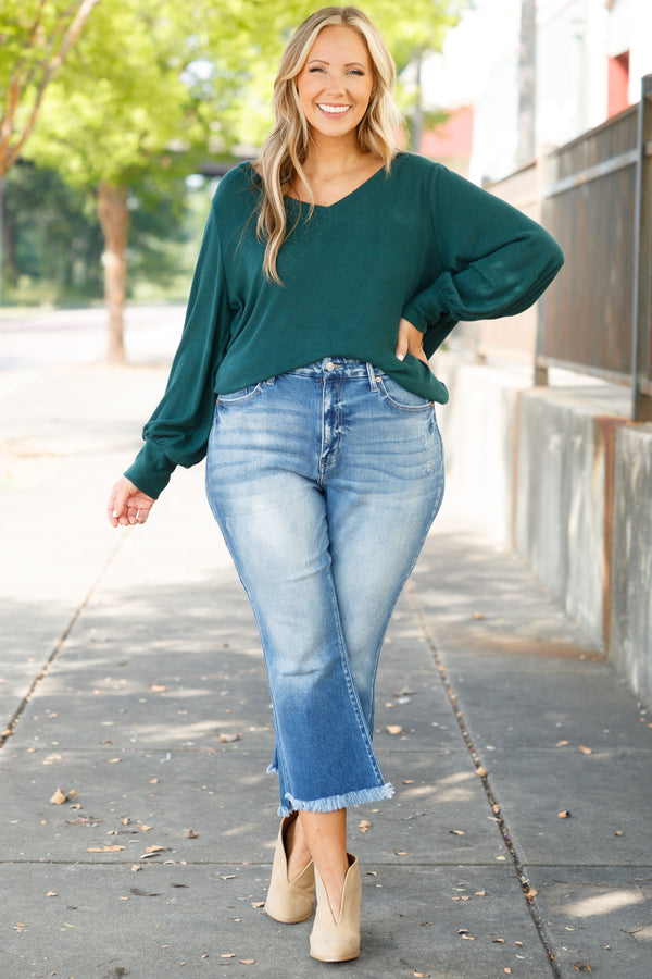 Chic Soul plus size clothing, medium wash denim capris with flare and frayed hemline