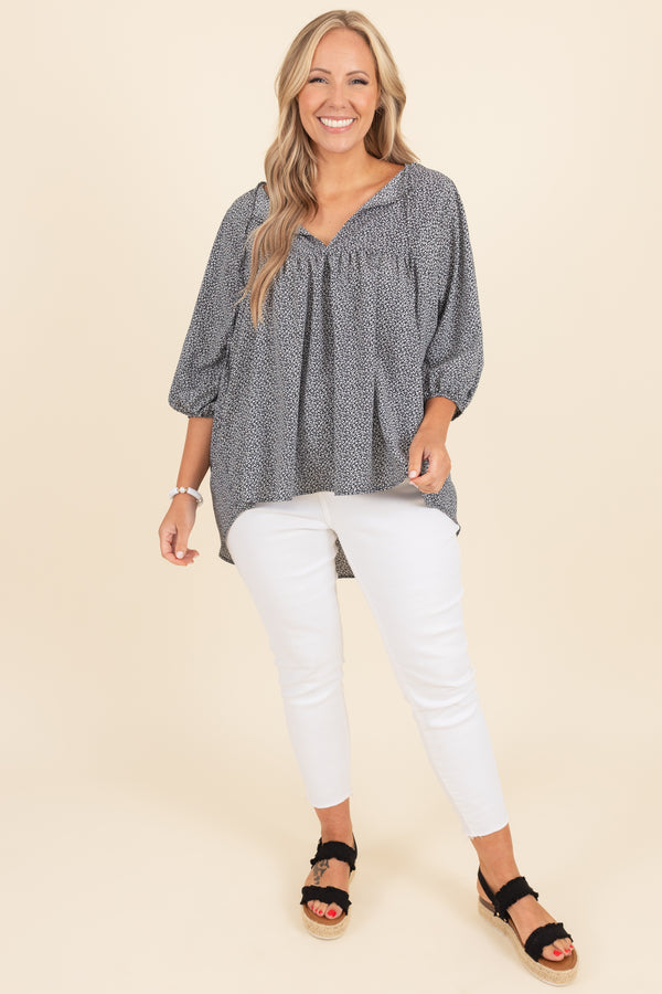 Chic Soul plus size clothing, black top with white pattern and bubble sleeves
