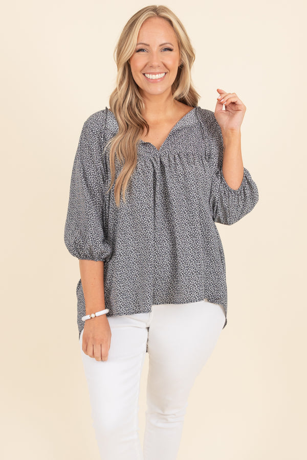 Chic Soul plus size clothing, black top with white pattern and bubble sleeves