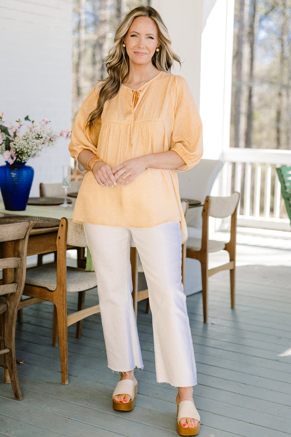 Chic Soul plus size clothing, orange and small white leopard print three-quarter puff sleeve top with string tie neckline
