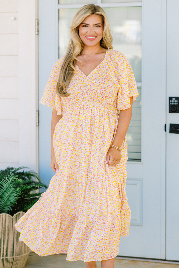 Chic Soul plus size clothing, pink short sleeve midi dress with smocked top with ruffle sleeves with v neckline with ruffle tiered skirt detail with small floral pattern