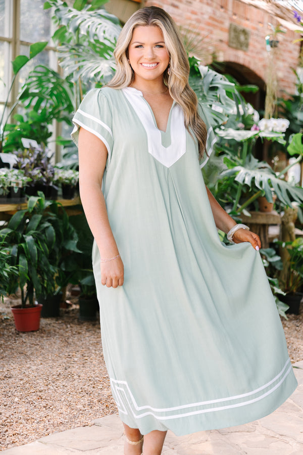 Chic Soul plus size clothing, sage maxi dress with white line designs outlining the bottom of the dress the end of the sleeves an a thick white strip outlining the v-neckline