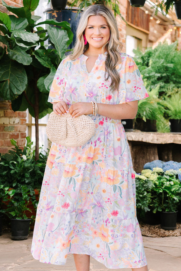Chic Soul plus size clothing, white maxi dress with short sleeves a cinched waist a slight v-neckline and a multi-color floral pattern throughout 