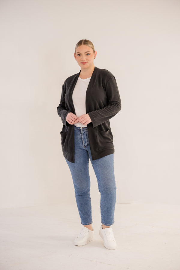 Chic Soul plus size clothing, black long sleeve minimal flowy cardigan with side pockets in the front