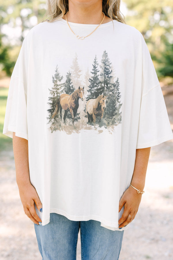 Plus Size ivory boyfriend tee in 100% cotton with a vintage horse and forest graphic.