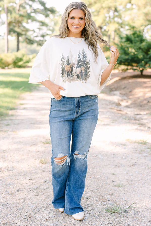 Plus Size ivory boyfriend tee in 100% cotton with a vintage horse and forest graphic.