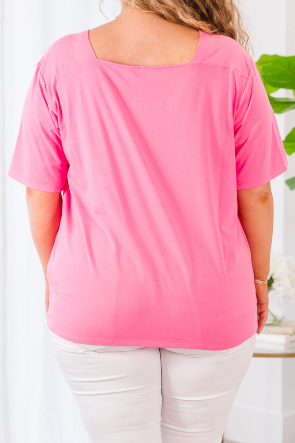 Plus Size pink short-sleeve top with a square neckline and a relaxed fit.