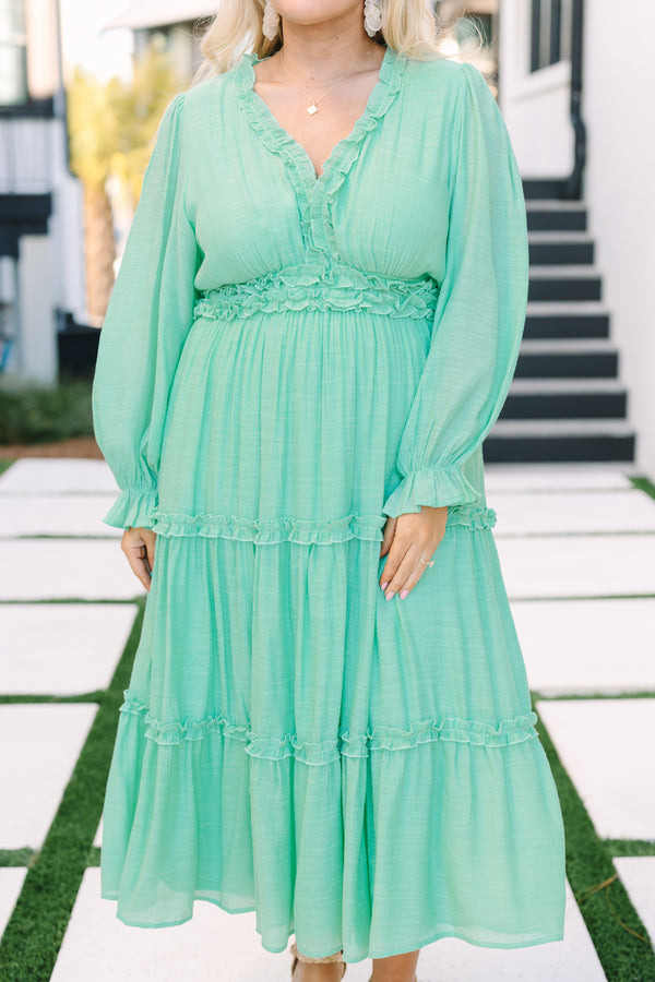 Chic soul plus size clothing, turquoise maxi dress with long bubble sleeves that have ruffle detailing along the bottom of each sleeve as well as ruffles at the bottom of each tier going around the waistband going along and down the v-neckline 