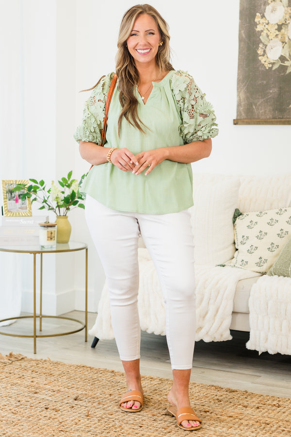 Chic Soul plus size clothing, short-puffed-sleeve sage green top with a split-v-neckline and floral lace detailing along the sleeve