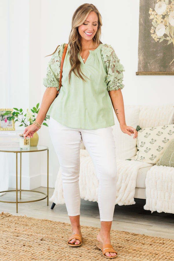 Chic Soul plus size clothing, short-puffed-sleeve sage green top with a split-v-neckline and floral lace detailing along the sleeve