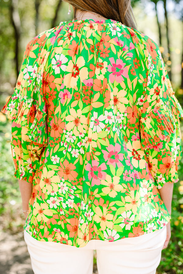 Chic Soul plus size clothing, quarter-sleeve green multi-colored ruffled top with a split-v-neckline with a multi-colored green floral pattern