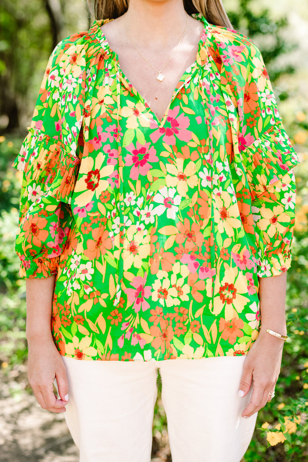Chic Soul plus size clothing, quarter-sleeve green multi-colored ruffled top with a split-v-neckline with a multi-colored green floral pattern