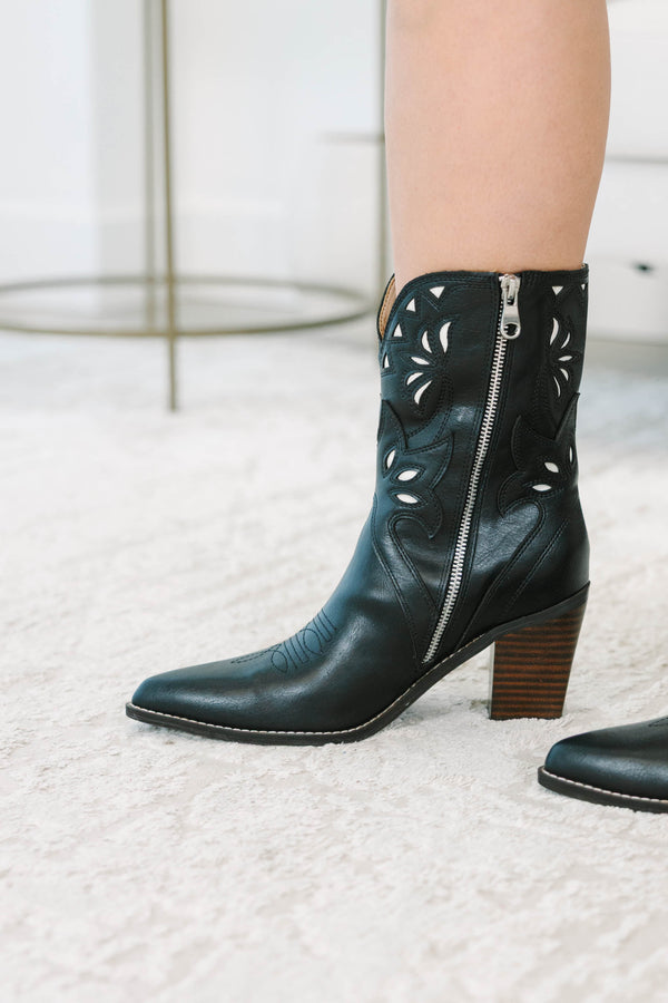 Plus size black western booties with white cutout details, red piping, and a stacked block heel.