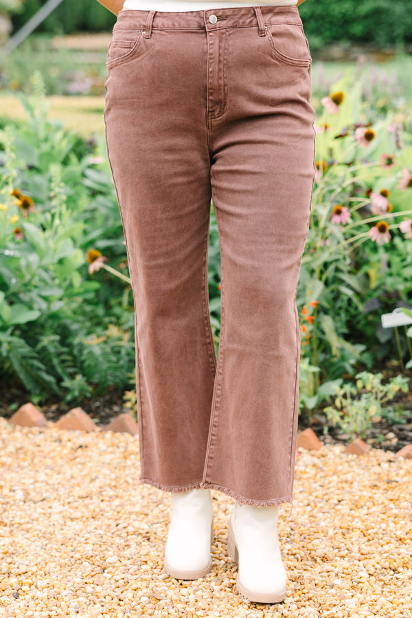 Plus Size high-waisted boot cut jeans in rum brown with a frayed hem and acid-wash finish.