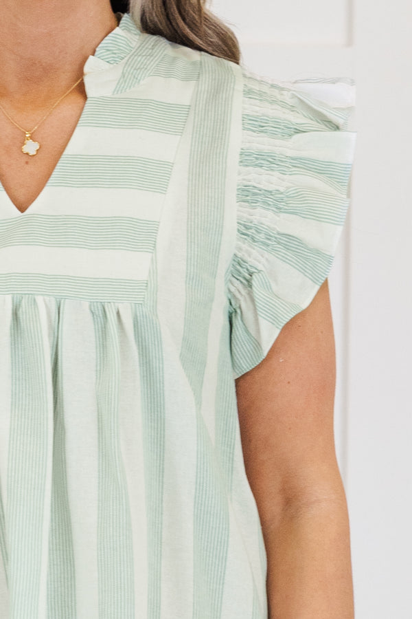 Plus Size green and white striped A-line dress with ruffle sleeves and a v-neckline.