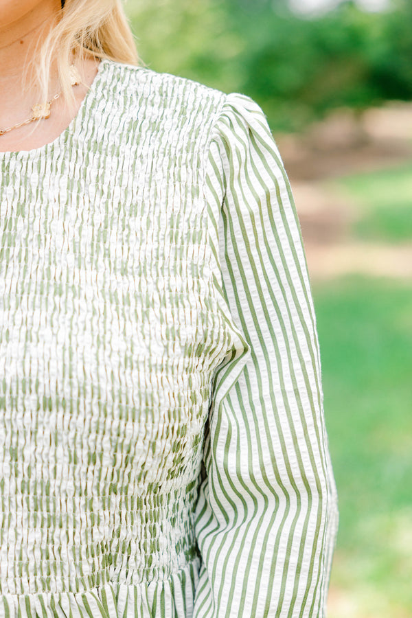 Chic Soul plus size clothing, green and white vertical pin stripe with rouching on the top and a peplum hem
